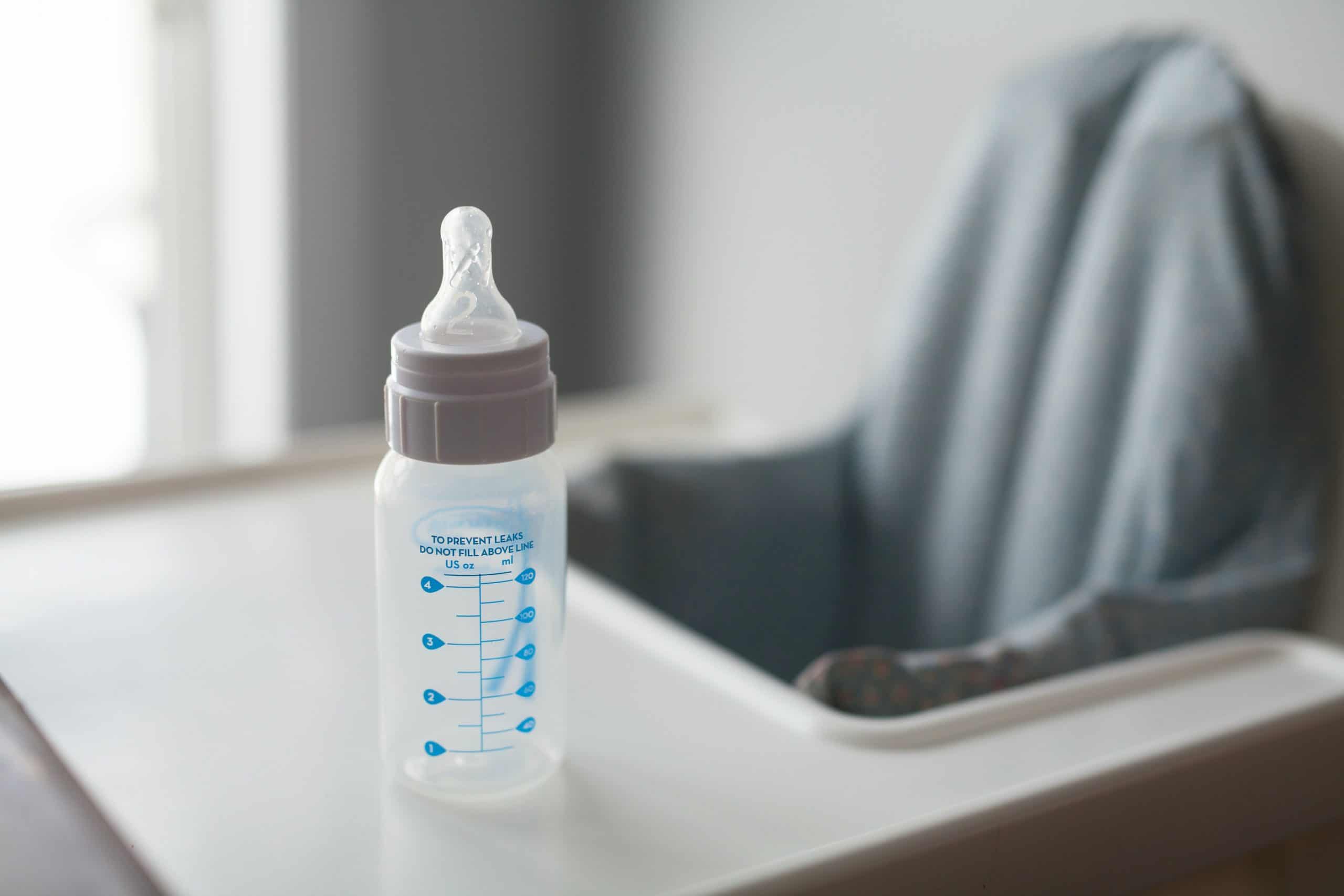 Baby bottle on highchair