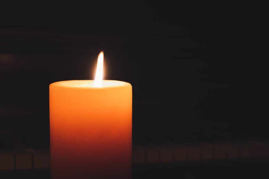 lit pillar candle